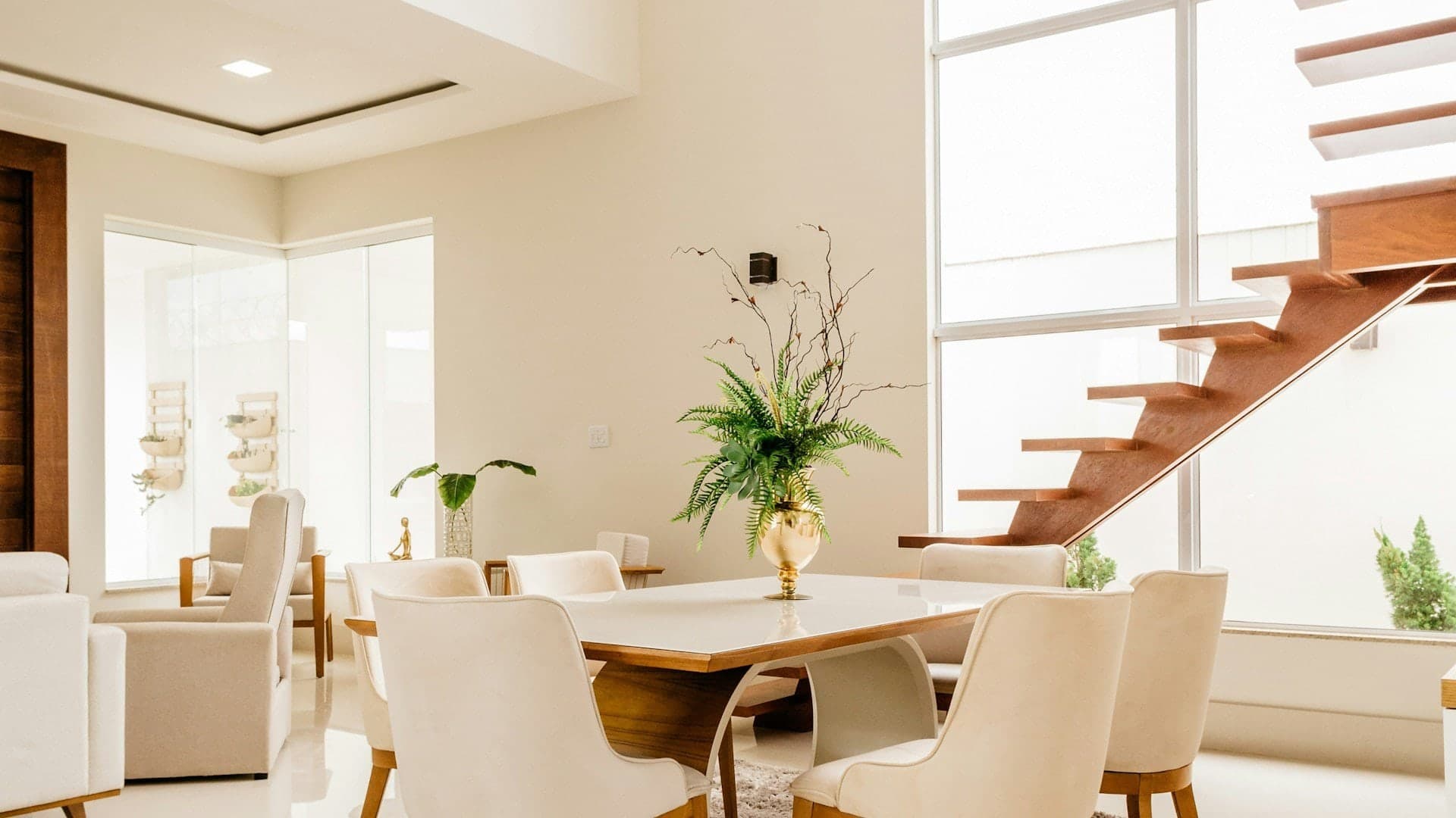 Elegant dining area with warm wood table and chairs